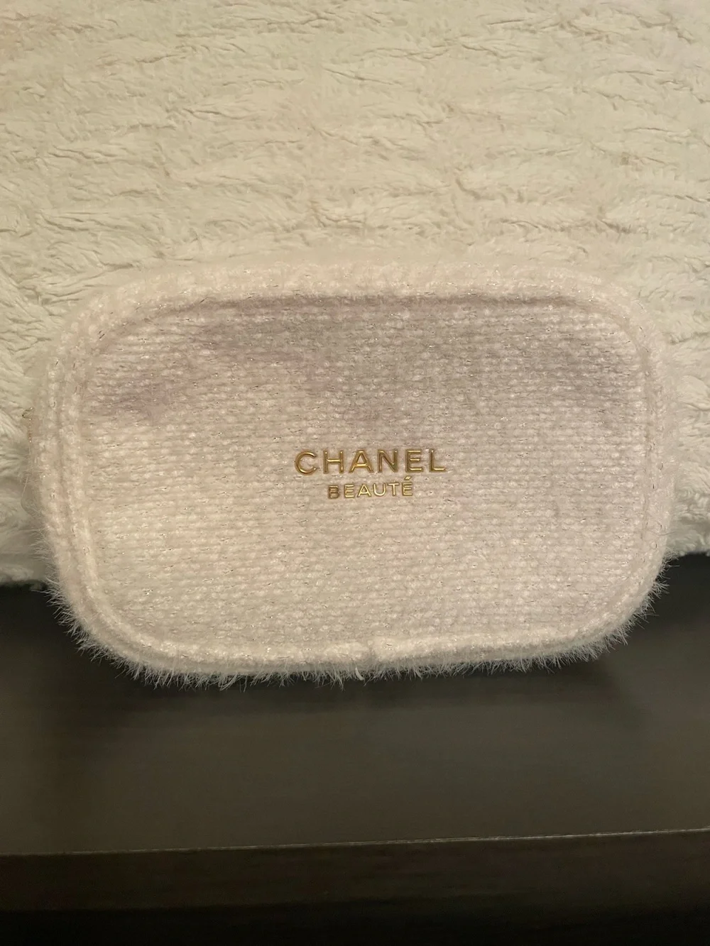 CHANEL white Faux-Fur makeup Case with Gold Logo